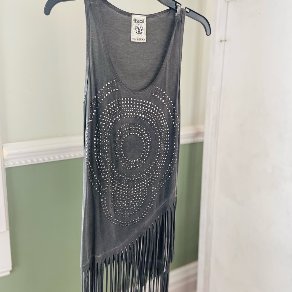 Wears well with leggings.  Very comfortable!